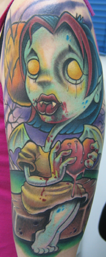 Looking for unique  Tattoos? vampire girl eating a heart tattoo